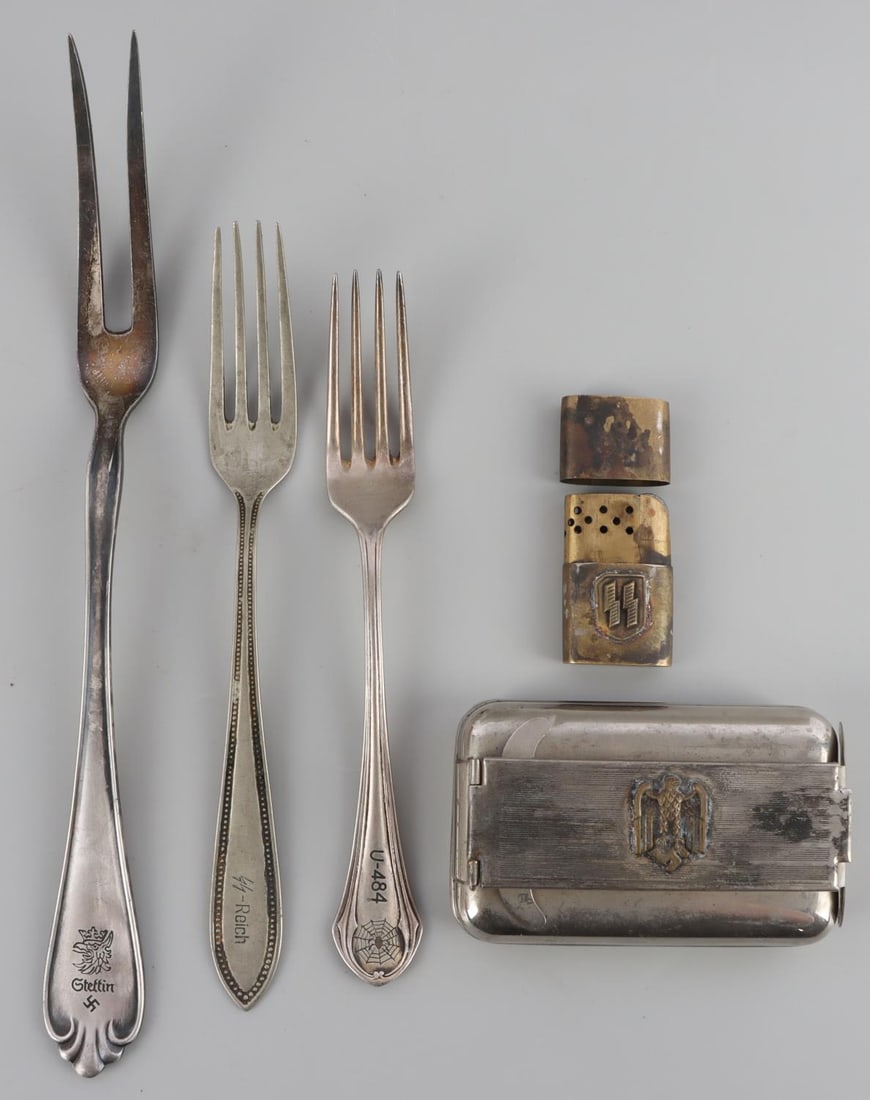 5 WWII GERMAN REICH HEER & SS FIELD SILVERWARE LOT: Lot of five(5) WWII German Reich field gear items including two forks, a two-prong meat fork, a field lighter, and lastly a field stove. Forks include an SS-Reich, marked "ALPACCA", and a Kriegsmarine