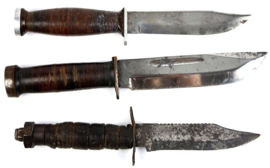 WWII FIGHTING KNIFE COLLECTION CATTARAUGUS & MORE: Collection of three WWII fighting knives to include Cattaraugus K chromed blade no sheath in very good condition, Schrade Walden H 15 no sheath in very good condition, and Vietnam Pilot survival knife