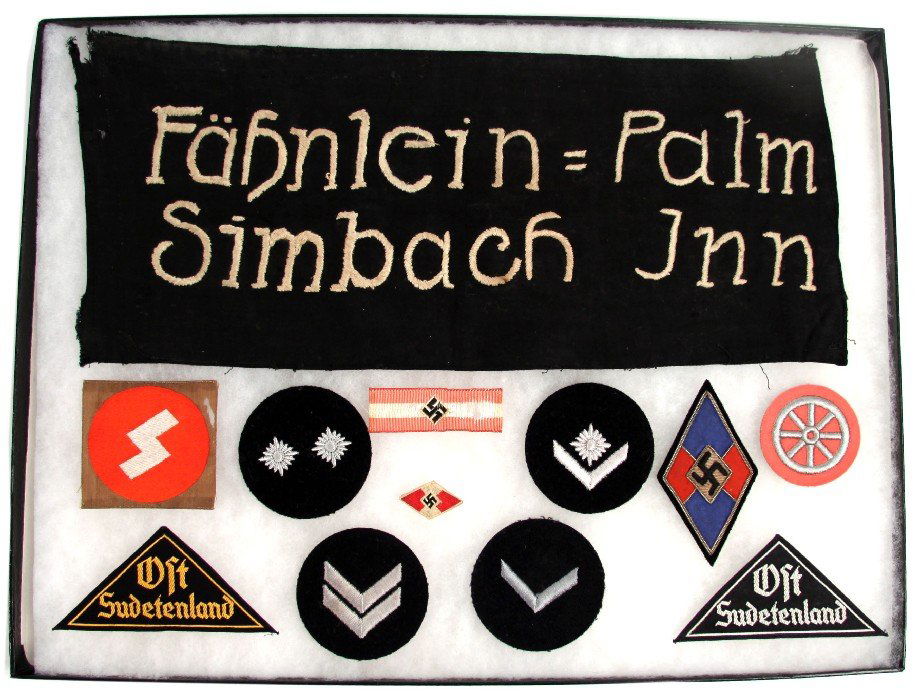 HITLER YOUTH HJ PATCH BANNER COLLECTION: A collection of Hitler Youth patches and either a banner or more likely a arm band, the patches are quite scarce and include a HJ bullion triangle, all have RZM tags attached, 11 total patches plus th