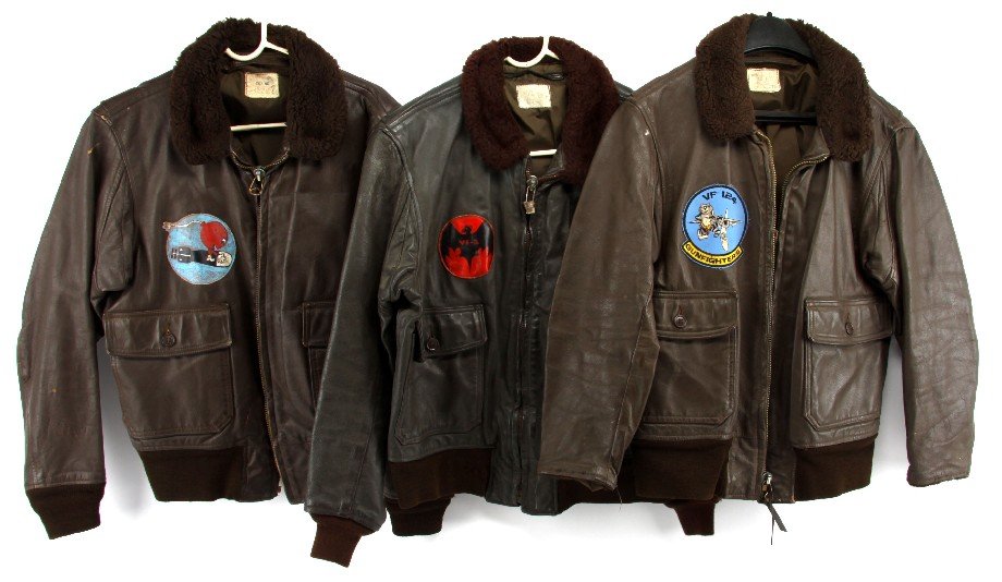 US NAVY G1 FLIGHT JACKET LOT OF 3 VF124 ASW VF 2: Grouping of three G-1 flight jackets, each with squadron patches including two leather in theatre patches, the VF124 jacket is minus sleeve ends, otherwise each are very good, all size 40.