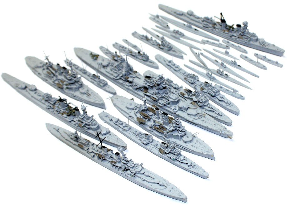 31 WWII NAZI KRIEGSMARINE WATERLINE MODELS NEPTUN: Thirty-one WWII German Nazi Wehrmacht Kriegsmarine die-cast recognition ID models "Made in Germany" (1:1200). Navis-Neptun models: Blucher (1031), Konigsberg (1043), Karlsruhe (1044), Emden (1045), Sc