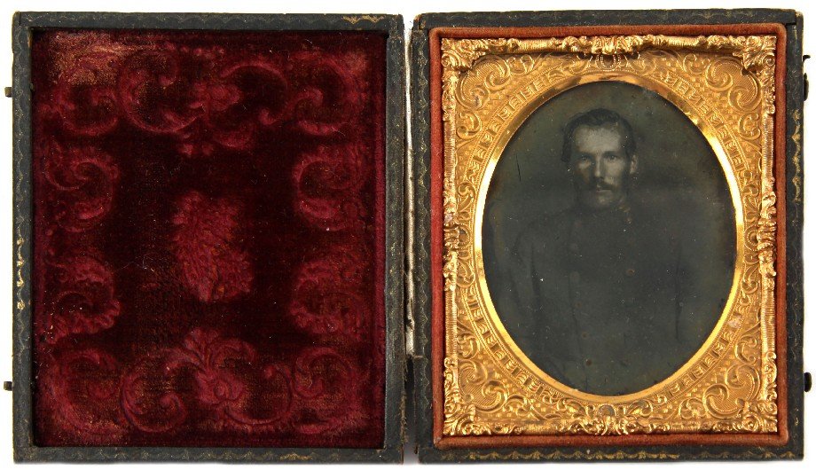NAMED CONFEDERATE SOLDIER AMBROTYPE PHOTO: A sixth plate (2.75 by 3.25 inches) glass Ambrotype of 1st Lt John A. Morrison of Co. G, 50th N.C. troops. He is depicted in DB frock fully buttoned. Image is faded. In union full case (outside of cas