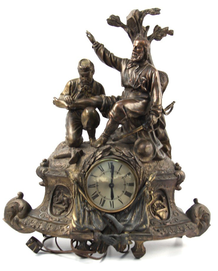 ITALIAN GARBALDI DECORATIVE CLOCK: Italian Giuseppe Garibaldi themed clock. Features a scene with Garibaldi being examined after being wounded, and the Capitoline Wolf (in lower pediment). Measures 20 by 19 by 7 inches. Movement appear