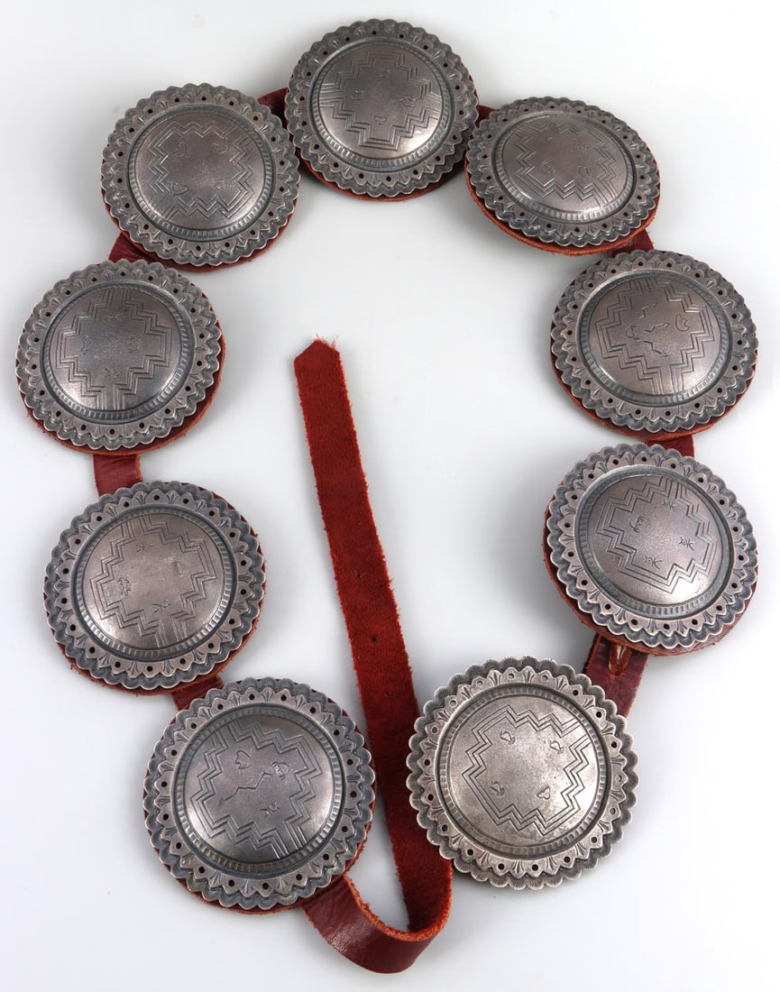 KR MORGAN STERLING SILVER LARGE CONCHO BELT: Quality handmade Native American Concho belt with hand tooled sterling silver 3 5/8 inch diameter conchas. Each have leather disk backing. Length of belt is 36-38 inches. Total weight 870 grams. This 