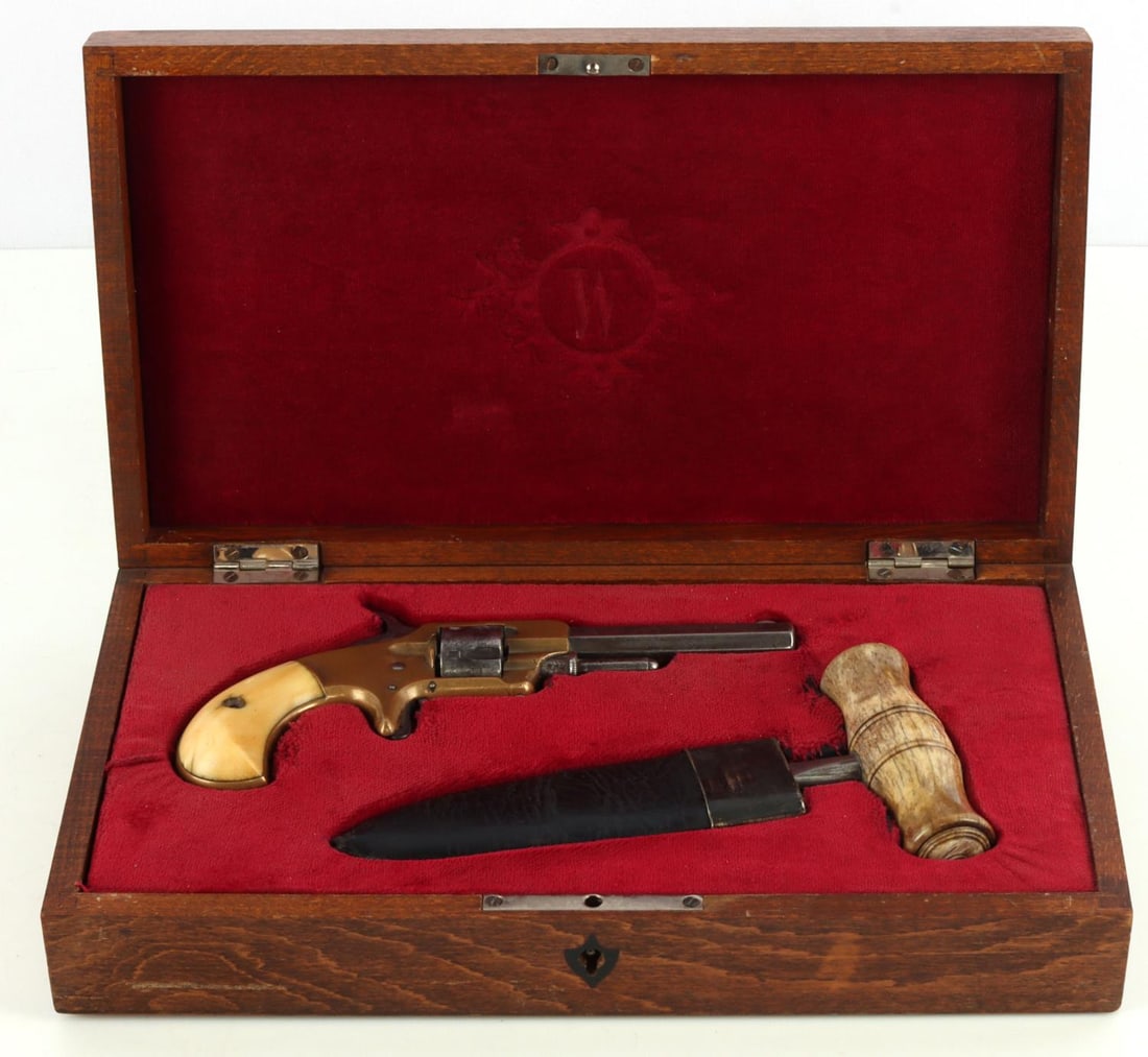 ANTIQUE GAMBLERS SET REVOLVER & MIKE PRICE DAGGER: Whitneyville & Armory Model No. 1 revolver with ivory grips. Rifling present but bore is needs to be cleaned. Mike Price push dagger with steel blade and bone grip. measures 6 1/2 inches and comes in