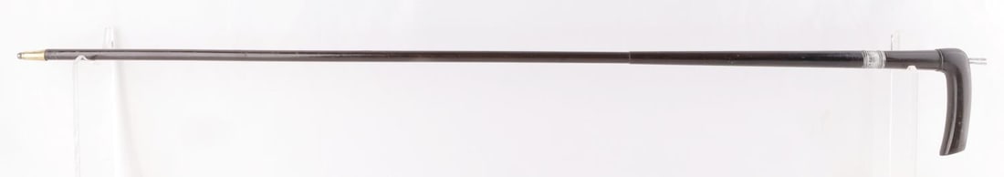 CIRCA 1880 FRANCAISE DE ARMES ST ETIENE GUN CANE: Horn grip, metal shaft, S/N 17583, 9 MM, fully functional very good original condition measures 34 3/4 inches. Pre 1898. This lot has a reserve.