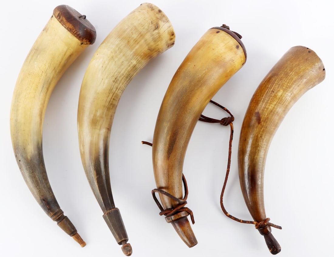 LOT OF 4 1800S ANTIQUE BLACK POWDER HORN FLASKS: Lot of four (4) 19th Century Antique Black Powder horn flasks for percussion firearms. Sizes range between approx. 10 1/2 inches to 12 inches. Two flasks feature remnants of a leather sling, three fea