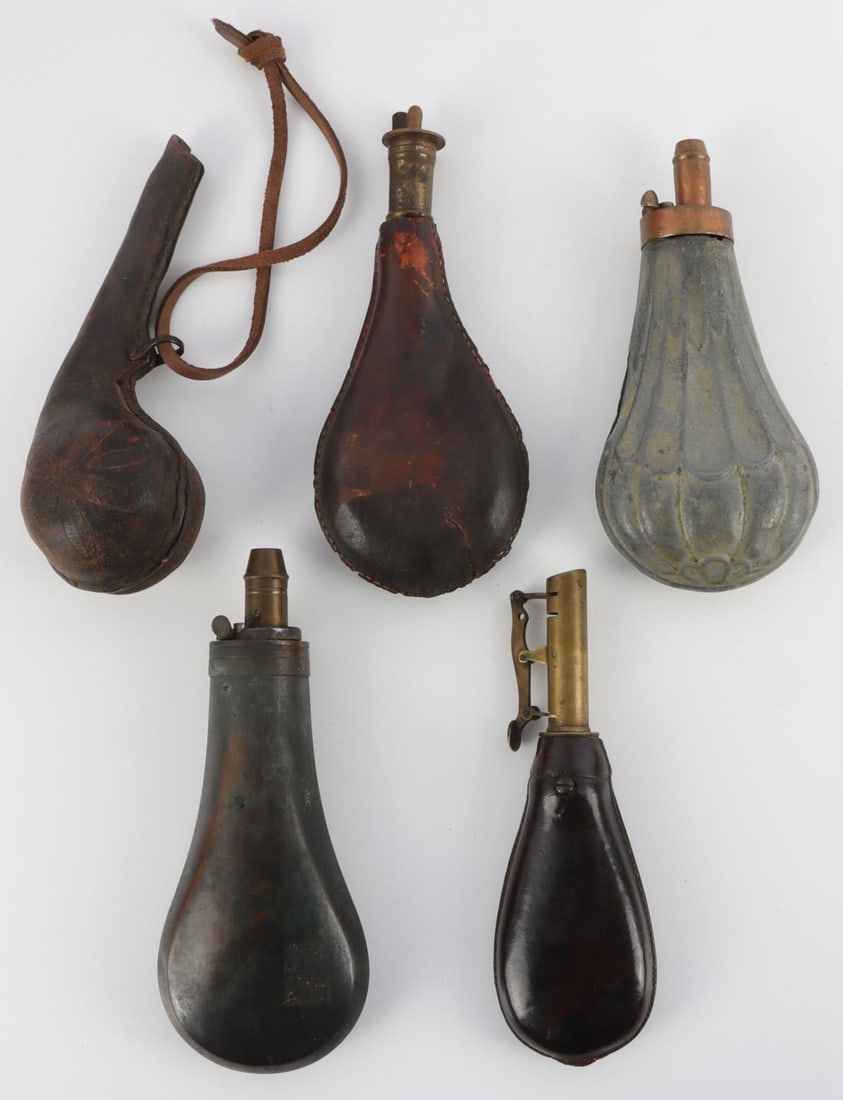 VINTAGE & ANTIQUE POWDER FLASK LOT OF 5: Lot of 5 black powder flasks. 3 leather and 2 metal and all are in very good condition.