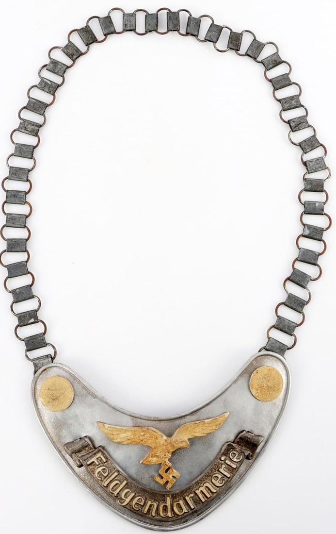 WWII GERMAN LUFTWAFFE FELDGENDARMARIE GORGET: Phosphorous painted, reverse large lugg dated 1935, good original condition.