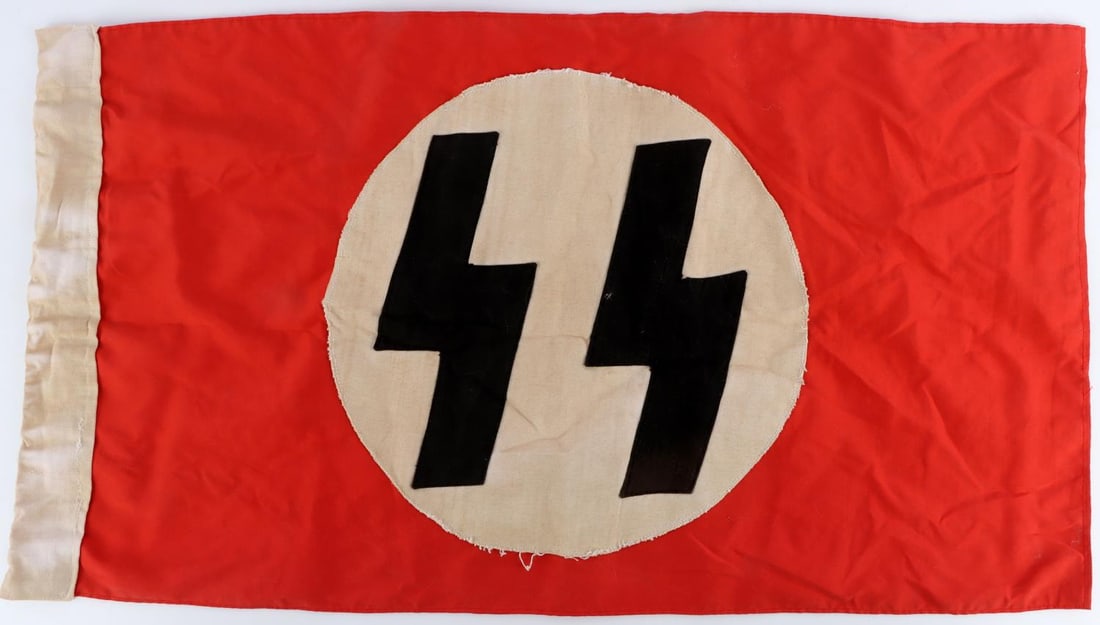WWII GERMAN SS MULTI PIECE FLAG BANNER: Does not fluoresce, roundel and Runes are sewn separately, SS and Eagle stamped on hoist, 45 x 70 CM also stamped on hoist, good original condition. Measures 16 X 28 inches.