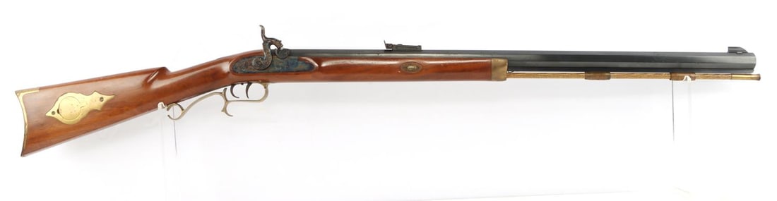 THOMPSON CENTER ARMS HAWKEN .54 PERCUSSION RIFLE: Barrel measures 28 inches long with a bright and clear bore, good rifling. Mechanically very good, with half and full cock functionality, set and normal trigger. Some light and scattered surface loss