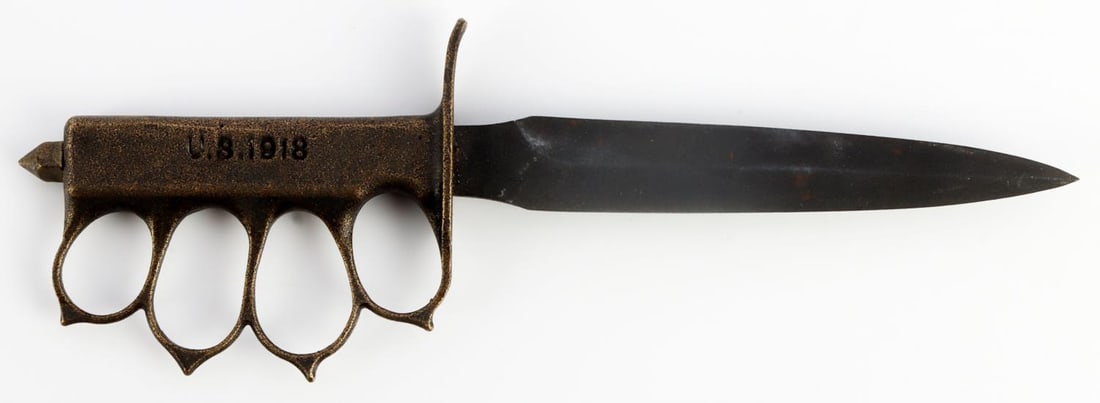 US WWI MARK 1 TRENCH KNIFE MINIATURE: Measures 7 1/4 inches. Brass grip. Very good condition.