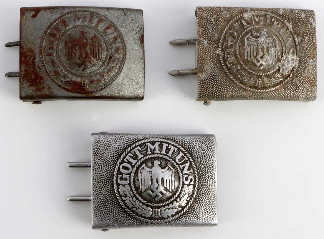 3 WWII GERMAN REICH HEER ENLISTED MEN BELT BUCKLES: Lot of three (3) WWII German Reich Heer army enlisted men belt buckles. Each buckles reads, "GOTT MIT UNS". Two are aluminum construction, one is made of steel. Each buckle has a manufacturer mark, " 