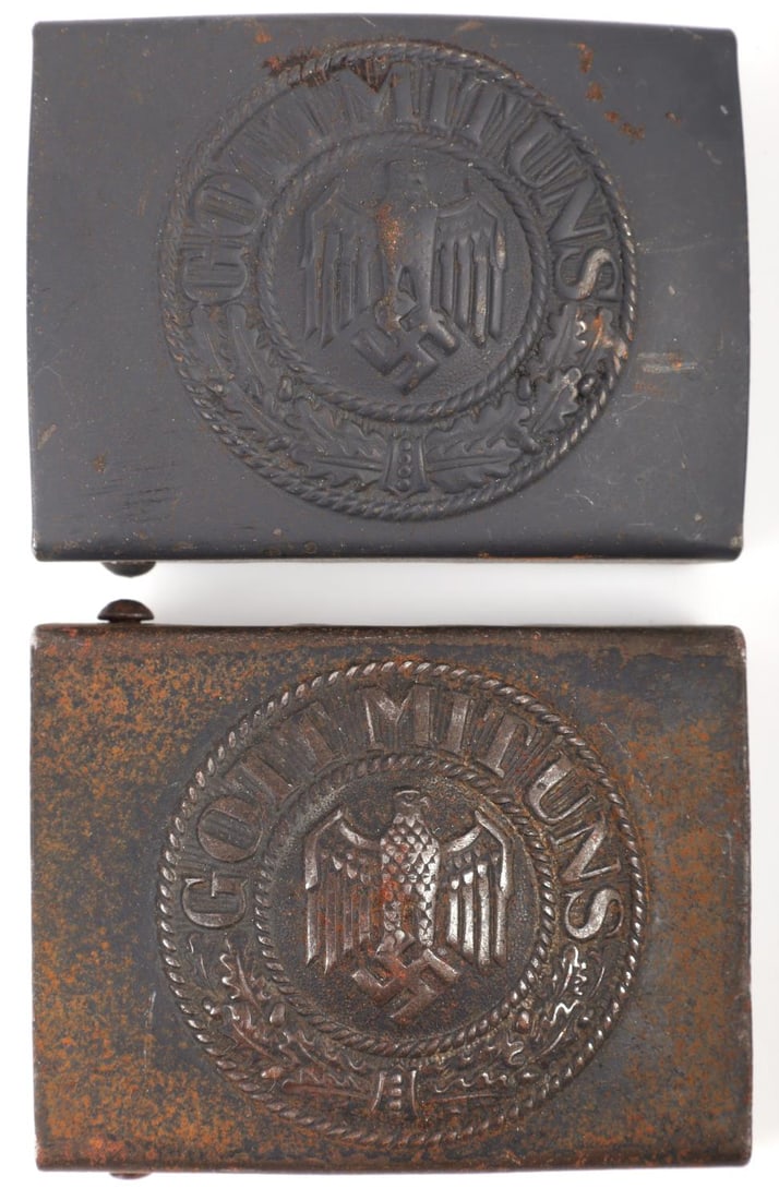 2 WWII GERMAN REICH HEER ENLISTED MEN BELT BUCKLES: Lot of two (2) WWII German Reich Heer army enlisted men belt buckles. Both are steel constructed and read, "GOTT MIT UNS" (God with us). Both are in good overall condition.