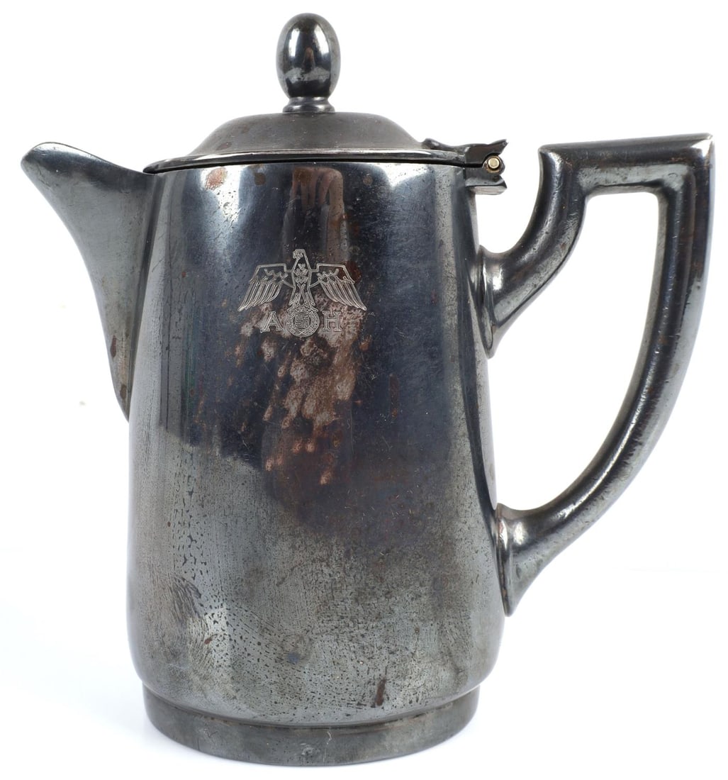 WWII GERMAN THIRD REICH SILVER COFFEE CREAMER POT: WWII German Third Reich coffee creamer pot. Wellner stamped on the bottom. A & H separated by the flying eagle stamped on the side. Dimension: 5.5 X 5 inches. In very good condition. Unauthenticated a