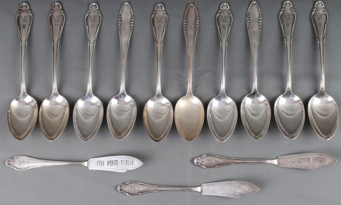 WWII GERMAN THIRD REICH SILVER WEAR LOT OF 13: Lot of 13 WWII German silver wear spoons and knives. 3 WWII German A H Wellner soup spoons. 5 WWII German SS Nevengamme Camp Wellner soup spoons. 3 WWII German SS Nevengamme Camp Wellner fish knives. 