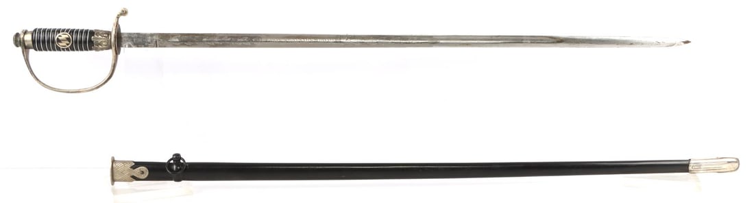 WWII GERMAN THIRD REICH SS OFFICER SWORD: Double etched blade with standard SS motto and reverse with "Honor price for excellent shooting". Both scabbard throat and under the crossguard washer have been SS proofed. Scabbard is anodized with B