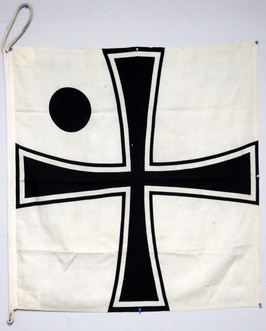 WWII GERMAN REICH KRIEGSMARINE VICE ADMIRAL FLAG: WWII German Reich Kriegsmarine Vice Admiral's(Vizeadmiral) flag. Features a black Iron Cross, fimbriated black and white, with a black disc in the canton. The hoist of the flag is marked with a Nazi p