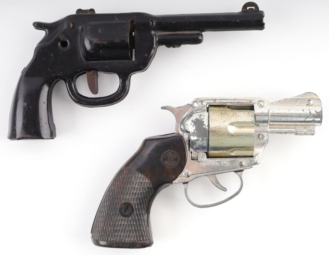 MATTEL SNUB NOSE & WYANNDOTTE TOY REVOLVERS: In good condition, functional. Some wear on exterior. Markings visible.