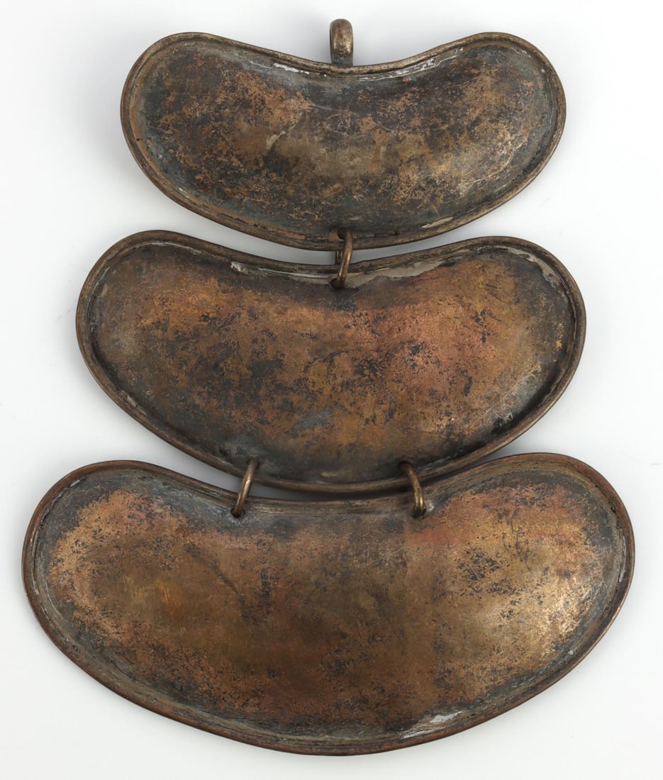 ANTIQUE NATIVE AMERICAN COPPER GORGET: Plains Native American copper gorget. It measures 5 X 4 1/4 inches. Very good condition. Patination featured.