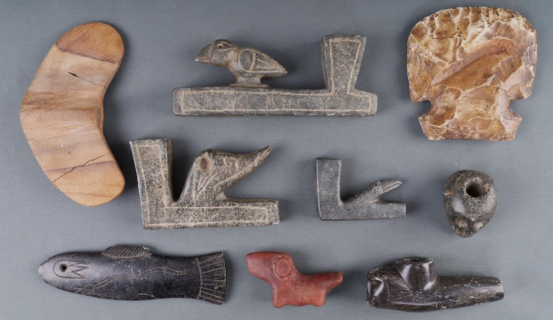 LOT OF 9 NATIVE AMERICAN PIPES BANNER STONE & AXE: Lot of nine (9) various Native America stones including platform pipes, an axe head, a banner stone, and stone figurines. Figurines include a fish and a dog. One pipe is a skull head. Stone sizes rang