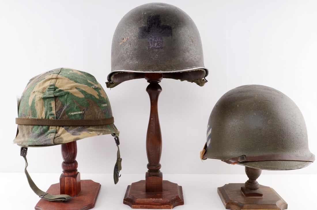 US ARMY HELMET LOT OF 3 WWII VIETNAM: 1 WWII US Army Front Seam Fixed Bale M-1 Helmet & Liner. 1 WWII US Army Fixed Bale M-1 helmet with Westinghouse liner. 1 M-1 Helmet Complete, Vietnam: This helmet features an original steel M-1 helmet