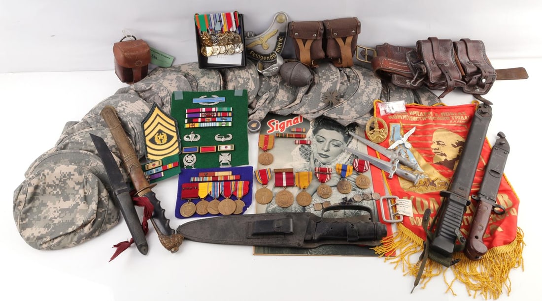 WWI WWII VIETNAM DESERT STORM MILITARY COLLECTIBLE: Large and varied grouping, authentic and non authentic, see photographs, sold as is .