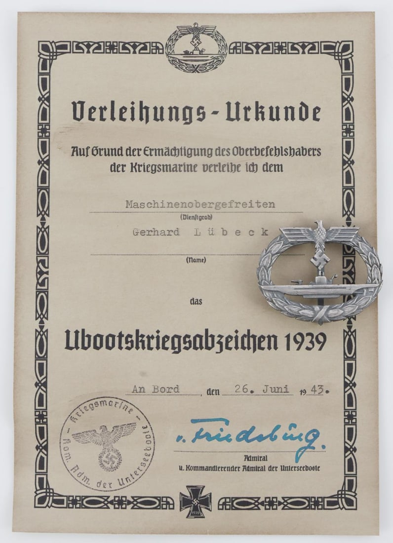 WWII GERMAN U BOAT BADGE W DOCUMENT: WWII German U-boat badge and award certificate. Badge is under 2 inches long and about 1.5 inches tall with clasp on back. Badge has some scratching and tarnish. Unauthenticated and sold as is.
