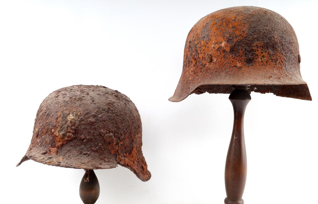 2 NORMANDY BEACH FOUND GERMAN M42 HELMET LOT: From an Iowa collection, widow said husband collected them in the 1960's, battlefield relics.