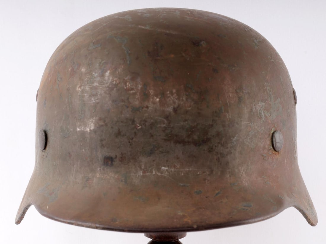 WWII GERMAN M38 STAHLHEIM HELMET: Decal was removed but has a shadow, without chinstrap, but has liner, rear stamped 6456, no other visible stampings, good original condition.