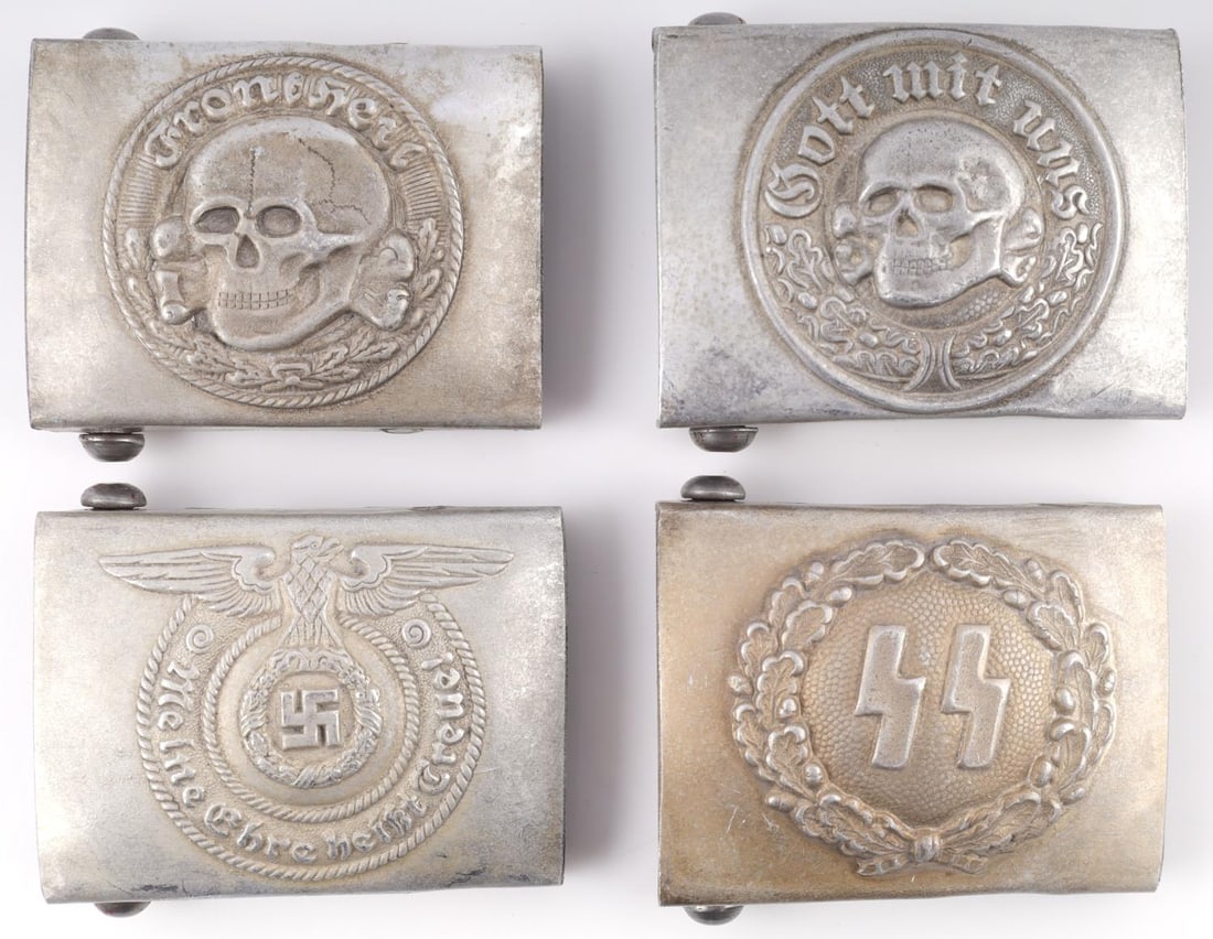 WWII GERMAN THIRD REICH BELT BUCKLE LOT OF 4: WWII German belt buckle lot of 4. 1 SS buckle, 1 enlisted mans buckle, 1 Waffen SS God with us buckle, 1 Wehrmacht DEATH HEAD ' buckle. All 4 stamped RMZ on the reverse and in very good condition. Una