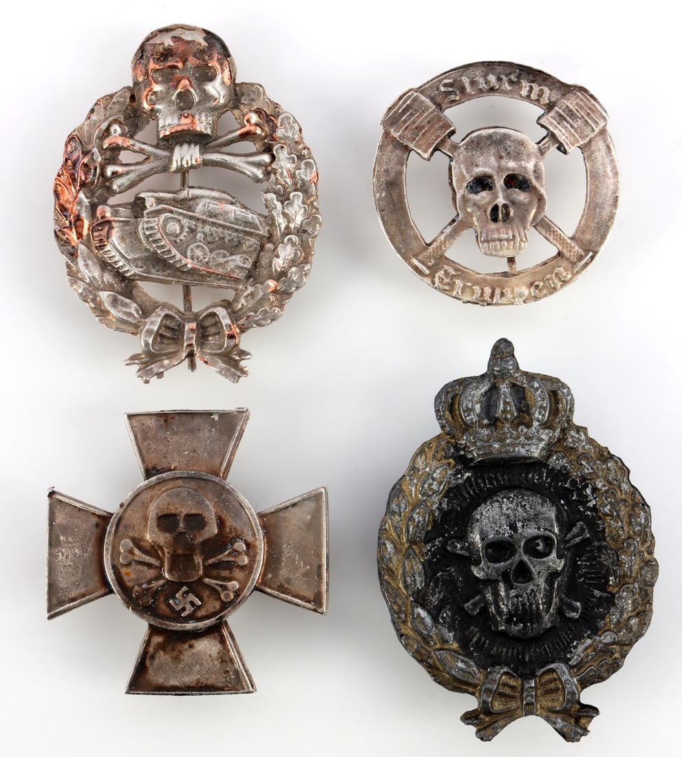 WWI & WWII GERMAN STORMTROOPER LOT OF 7 MEDALS: Two WWI German Imperial storm trooper badges including one featuring a skull and crossbones wrapped in oak and laurel wreath and topped with a crown, a Storm Trooper award badge, and a WWII Nazi Germa