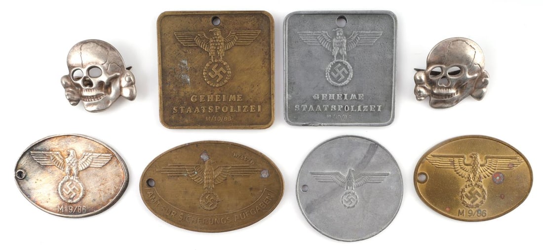 6 GESTAPO ID DISC LOT & 2 TOTENKOPF INSIGNIA: As photographed, sold as is, unauthenticated