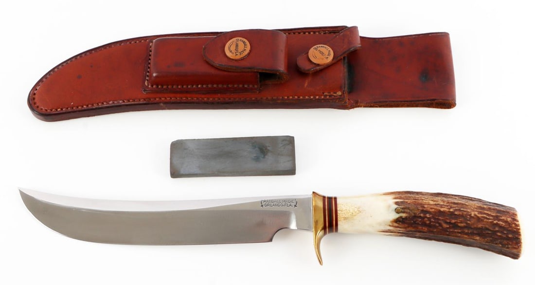 RANDALL MODEL 4 BIG GAME & SKINNER KNIFE W SHEATH: Randall Made, Model 4 "Big Game & Skinner" knife, with leather Randall sheath. 7-inch stainless steel blade. Single brass hilt. Thumb notch. Samber stag finger handle with seven spacers between grip a