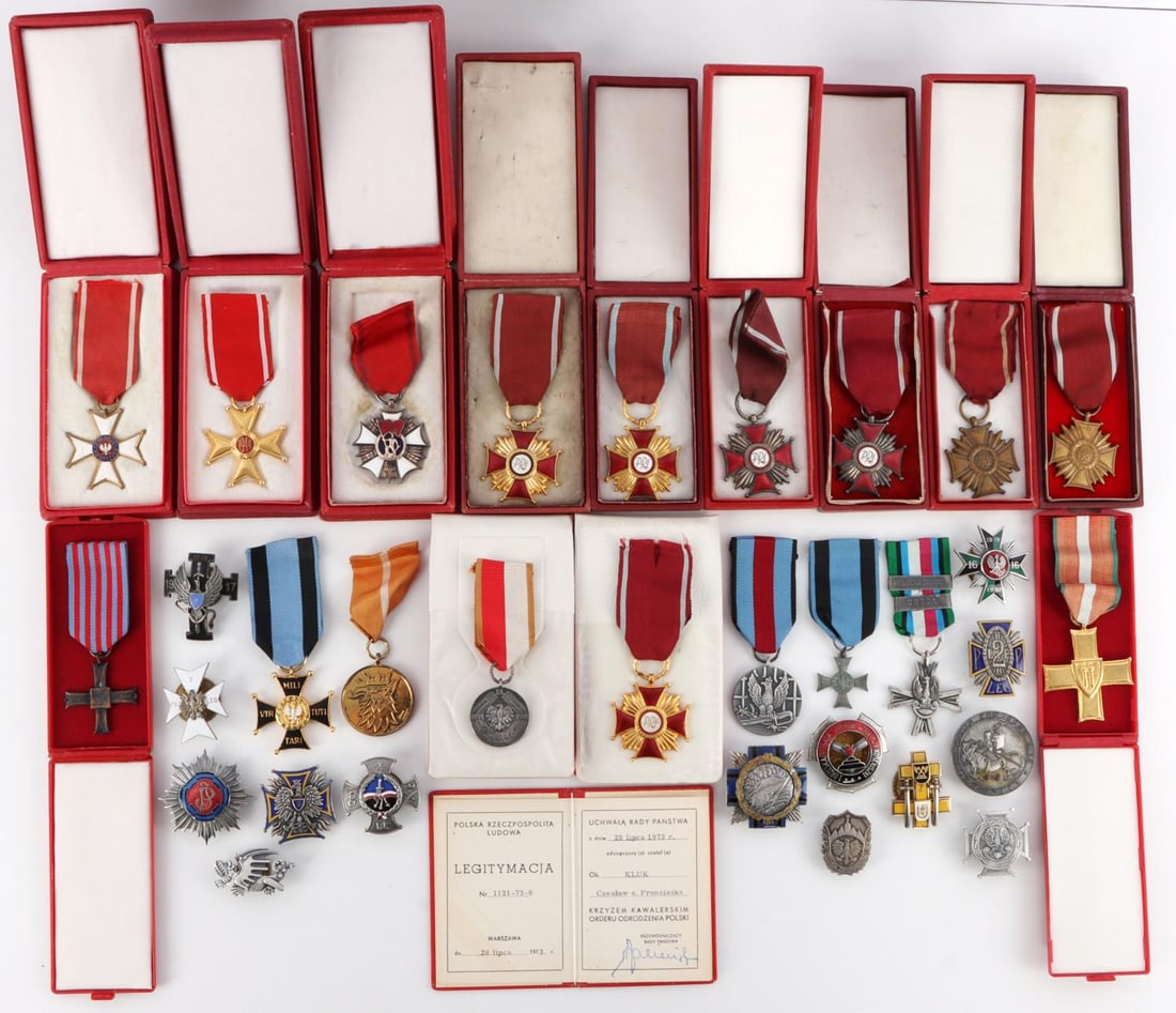 32 WWI TO POST WAR POLISH MILITARY REGIMENT MEDALS: Lot of thirty-two (32) WWI to post-war Polish military medals and regiment badges (some with cases). Includes a cased Polish Order of the Standard of Labour, a cased Polonia Restituta, Polish Merit Cr