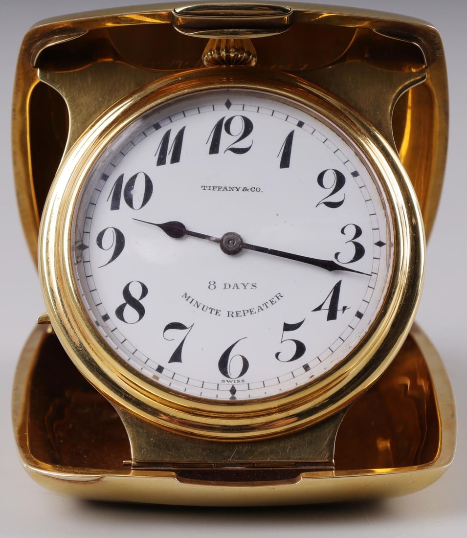 BRIGADIER GENERAL TIFFANY CO DESK CLOCK 14KT GOLD: Tiffany & Co 8-day Minute Repeater desk clock. Acid tests for 14kt gold, but is not marked. Weighs 350 grams. Monogrammed with CCJ initials and features a dedication on interior of case. Measures 4 X