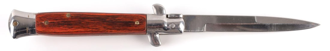 VINTAGE ITALIAN STILETTO SWITCHBLADE KNIFE: Stainless steel blade, wood grips. Measures 8 5/8 inches. Safety does not work.