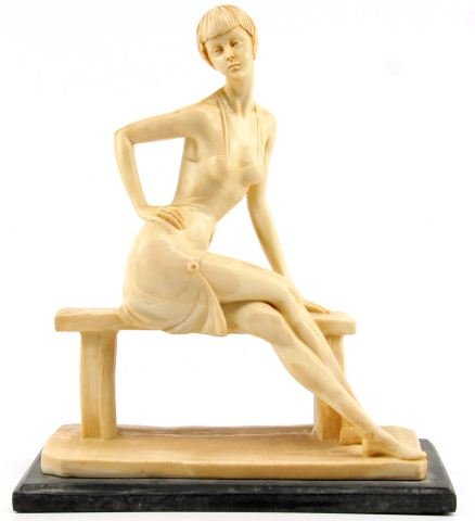 A. SANTINI CAST CARRARA MARBLE FLAPPER STATUE: Cast Italian Carrara marble statue of a seated Art Deco Flapper female figure on black Carrara marble base singed A. Santini. Measure 12 by 10.25 inches; in very good condition.