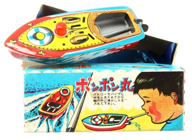 JAPANESE METAL TOY BOAT: Toy is in original box. Great tub toy for kids. It is in excellent condition.