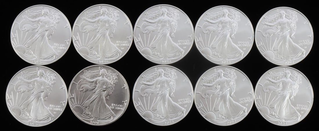 10 AMERICAN SILVER EAGLE 1 OZ SILVER DOLLAR COINS: Mixed dates. Electronically tested from the refinery. Guaranteed. This lot has a reserve.