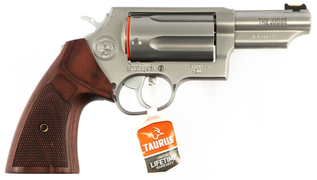 TAURUS JUDGE EXECUTIVE GRADE .410 GA REVOLVER NIB: New in box. Model #2-441EX039. UPC:7253279380263-inch barrel. Silver steel with brown textured wooden grips. Comes in "VAULT by Pelican" carrying case. FFL required for transfer. No international ship