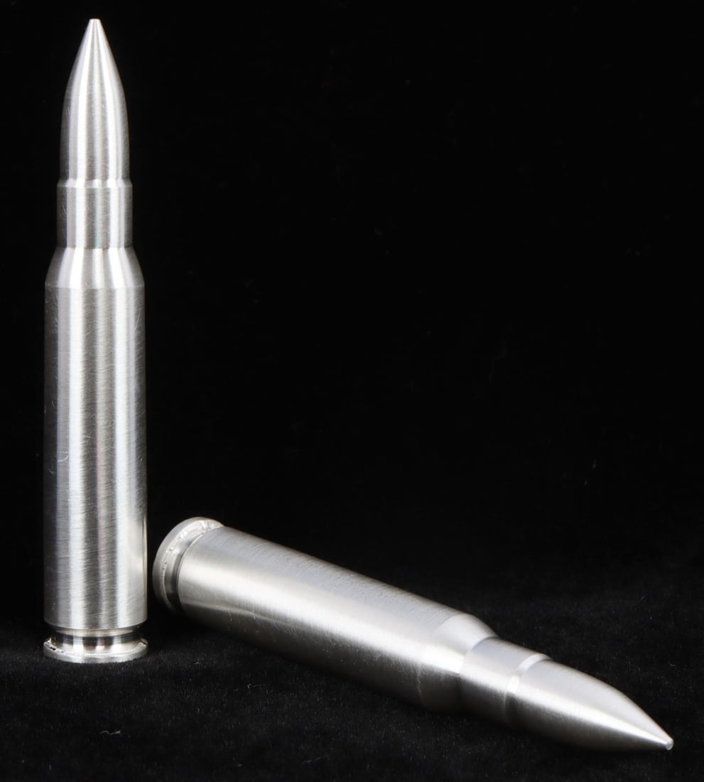 SILVER BULLET BULLION ROUND .308 CAL 4 OZ TOTAL: Lot of TWO 2 oz. silver bullets (.308 cal.) modeled after the distinguished .308 Winchester rifle ammunition. Each contain .999 fine silver. This lot has a reserve.