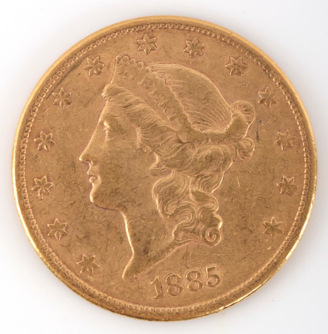 1885S TWENTY DOLLAR LIBERTY GOLD DOUBLE EAGLE COIN: VG details from circulation. Contact marks in the field. Detail loss on hair. Minor wear on Liberty. 90% fineness. 0