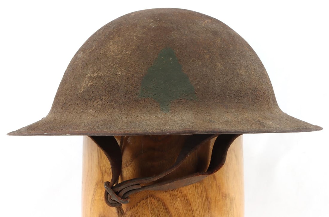 WWI US M1917 91ST WILD WEST DIVISION BRODIE HELMET: WWI or WWII United States M1917 91st "Wild West" 91st Infantry Division Brodie Helmet. Helmet features the Infantry Division's insignia on the front. Interior features one rivet swivel bales with a le