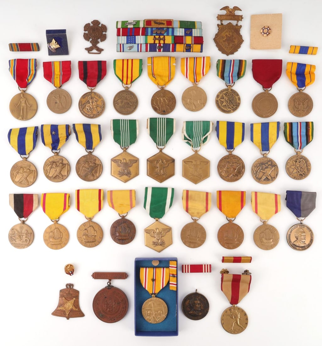 WWII TO POST US ARMED FORCES MEDALS & RIBBON BARS: Lot of approx. forty (40) WWII to post-war United States Armed Forces campaign and victory medals including Asiatic-Pacific Campaign, Navy China Service, Vietnam Service, National Defense, WWII Victor