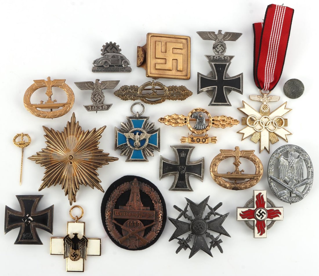 WWII GERMAN THIRD REICH POST WAR MEDALS & BADGES: An assortment of badges and medals such as Iron Cross, Fire Brigade, U-boat, and more. Very good condition. 0