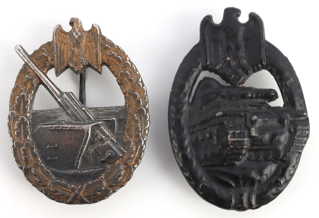 WWII GERMAN ARTILLERY AND TANK ASSAULT BADGES: Kriegsmarine artillery badge marked FLL. Tank badge has no markings. They measure 2 1/8 inches. Very good condition. 0