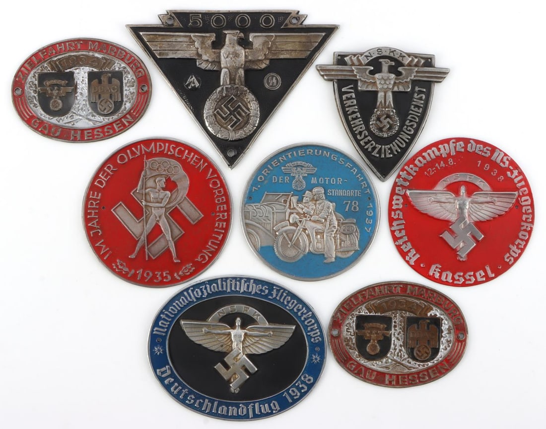 LOT 8 WWII GERMAN THIRD REICH SHIELD AWARD BADGES: Lot of 8 WWII German Third Reich sleeve shields. 1938 NSFK Pilot's Champion (3X3.75 inches), 1937 NSKK Motor-Standarte (3 inch diameter), 1935 Youth Pre-Olympic Championship (3 inch diameter), 5000km 