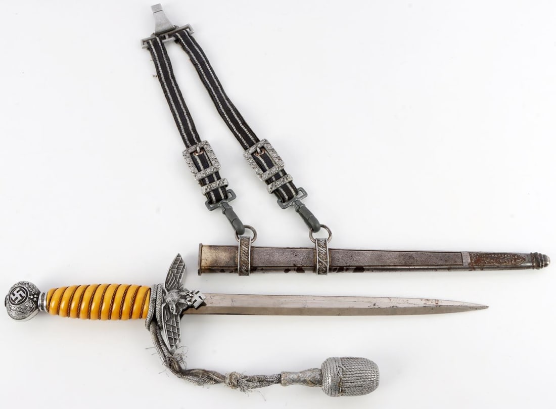 WWII GERMAN REICH LUFTWAFFE OFFICER'S DRESS DAGGER: WWII German Luftwaffe officer's dress dagger in good condition with scabbard, hangers and portapee. Blade in good condition. Stamped on ricasso "Carl Julius Krebs Solingen." Crossguard, grip, pommel i