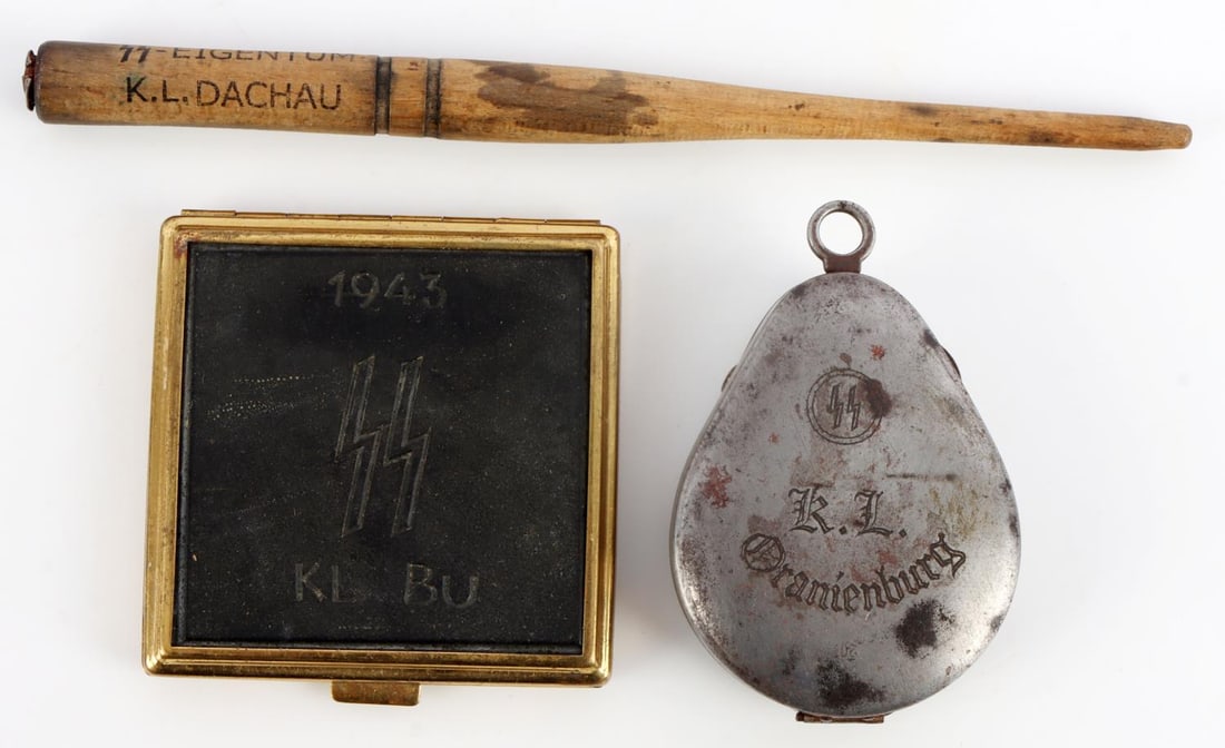 WWII GERMAN SS MAKE UP CASE LTR OPENER CANTAINER: WWII German wood letter opener. "SS-Eigentum K.L. Dachau" engraved. 6.75 inches in length. WWII German SS-Helfrein make up case Buchenwald. Engrave "1943 SS KL BU on the reverse. WWII German small ste